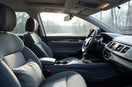 Comfort-focused car interior with upgraded seats, soft lighting, and clean dashboard details