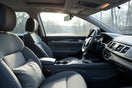 Comfort-focused car interior with upgraded seats, soft lighting, and clean dashboard details