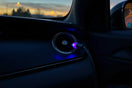 USB atmosphere light glowing softly along a car’s interior trim plugged into the dashboard USB port
