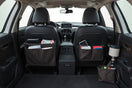 Car interior with modular organizers keeping the console and trunk neatly stored