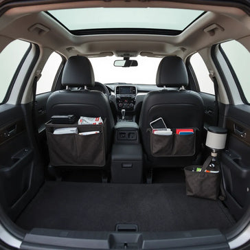 Car interior with modular organizers keeping the console and trunk neatly stored