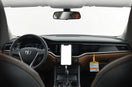 Driver-focused car dashboard with intuitive touch controls and clear digital displays