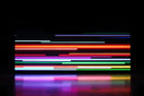 RGB scrolling screen displaying smooth animated colors and horizontal light motion on a dark background