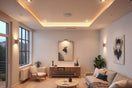 Modern LED ceiling lights and wall sconces in a warm, uncluttered living room at dusk