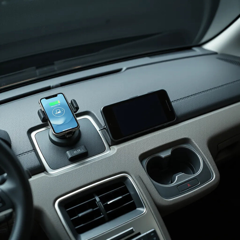 Modern car interior with a phone mount charger and compact safety accessories on the dashboard