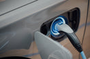 electric vehicle charger plugged into car