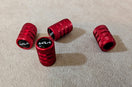 A group of red grips sitting on top of a carpet