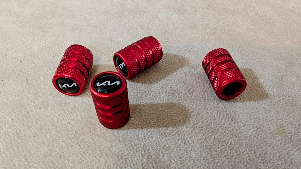A group of red grips sitting on top of a carpet
