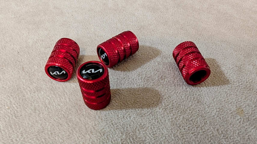 A group of red grips sitting on top of a carpet