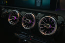 Close-up of car air vents with ambient lighting