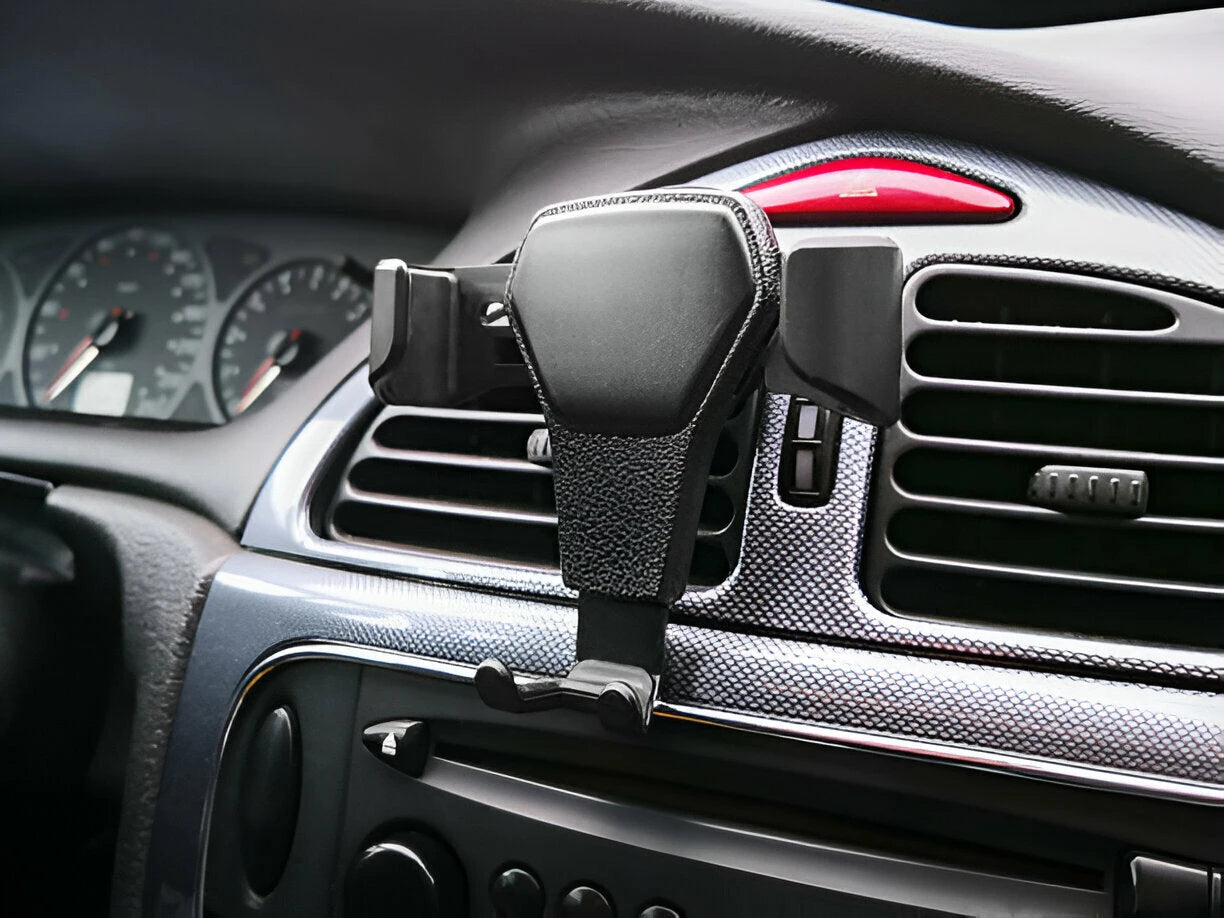 A clean, upgraded car interior with seat covers, organizers, and steering wheel covers visible.
