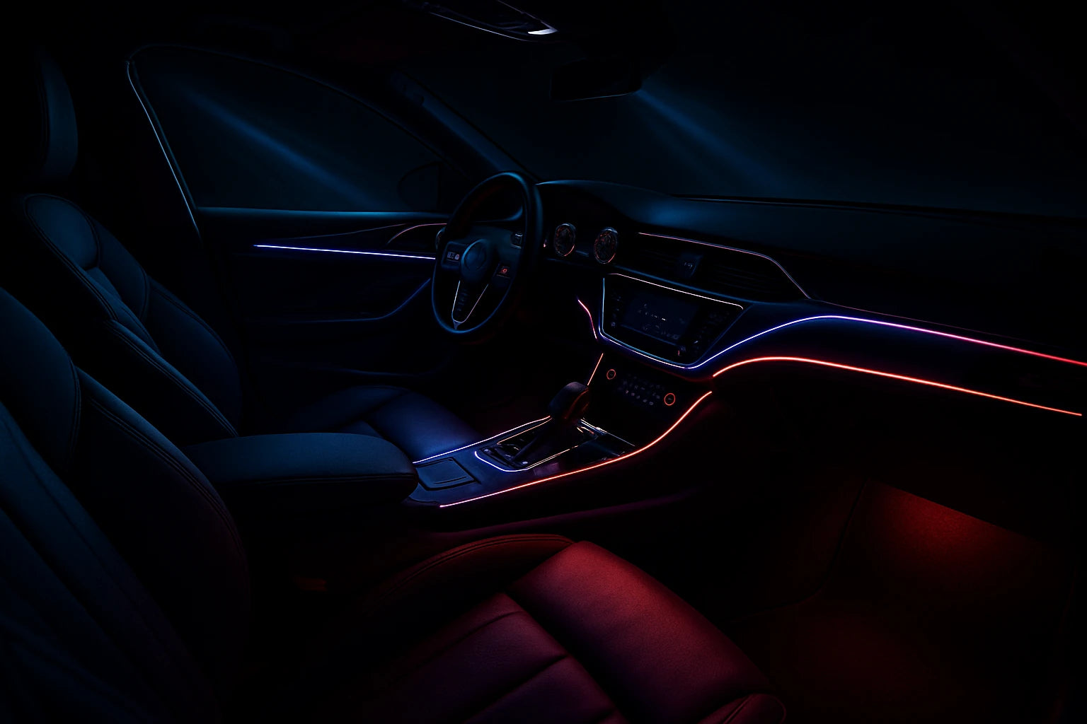 A car with upgraded LED headlights and interior ambient lighting shown at night.