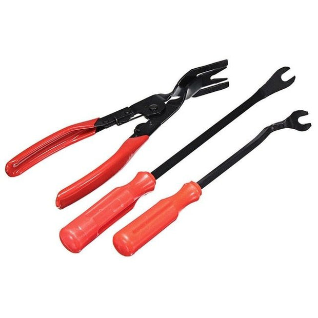 Three automotive trim removal tools. One set of pliers with black metal jaws and red handles, and two pry bars with black metal shafts and red plastic handles.