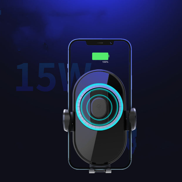 A smartphone is wirelessly charging on a black car phone holder with blue LED accent lights. The phone's screen indicates that it is 100% charged. A "15W" is superimposed to the left of the phone.
