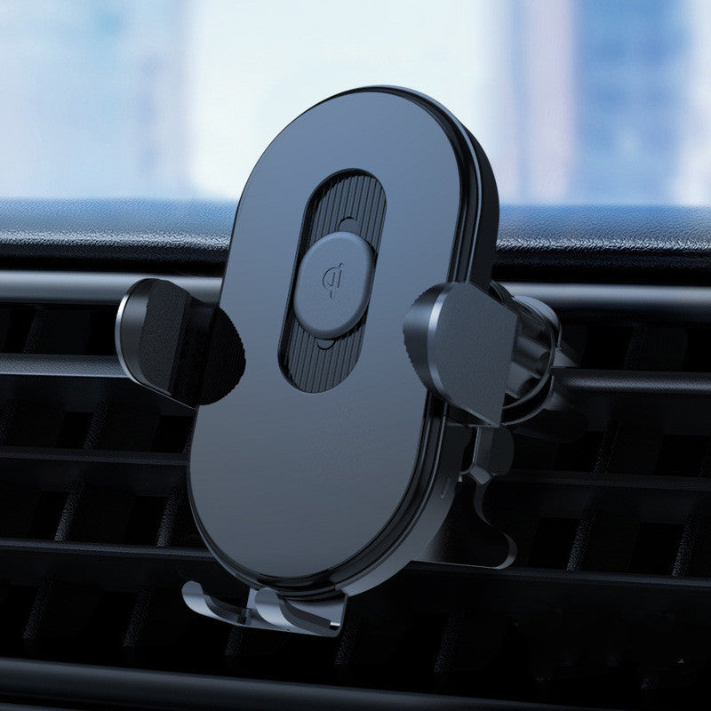 Close-up of a dark gray car air vent phone holder with a wireless charging symbol.